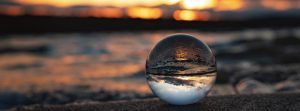 sunset with glass sphere, seek the kingdom