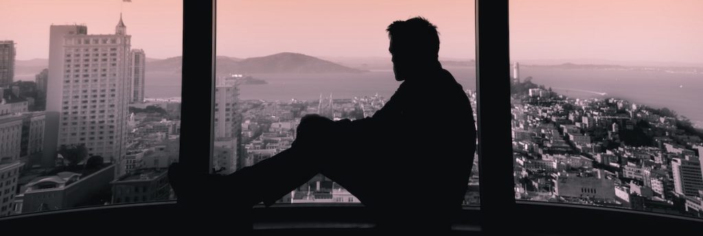 man contemplating skyline, why do I feel guilty