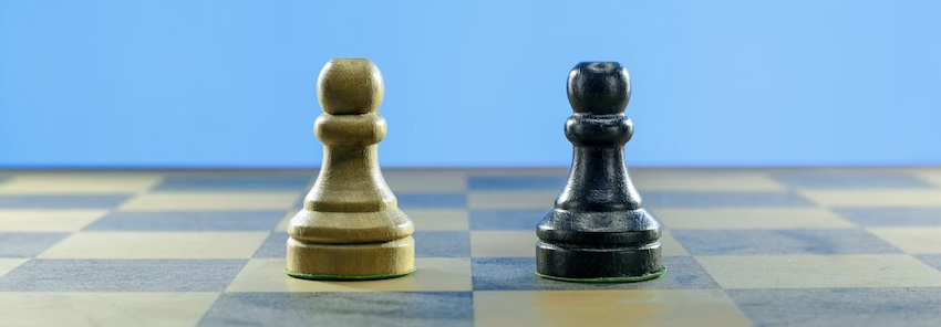 two chess pawns one white and one black, don't compare yourself to others