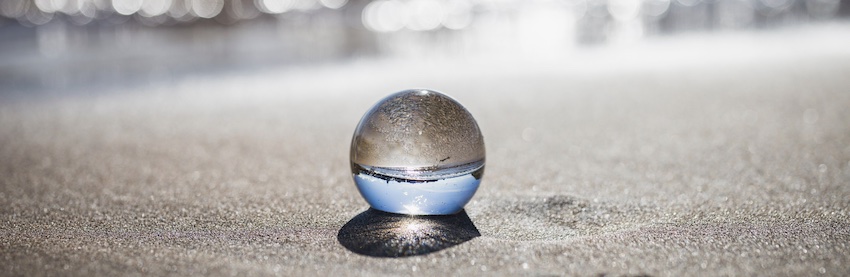 glass ball on beach, spiritual identity