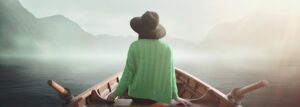 girl with green sweater on row boat, God teaches