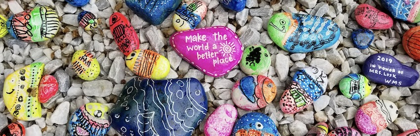 Painted beach rocks, spiritual riches